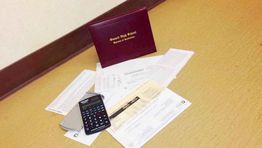 Former Oxnard High School student Angeline Valerios high school diploma and random bills.