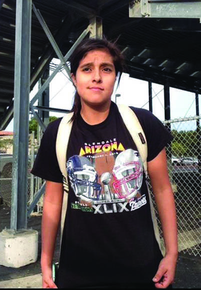 Oxnard High School Senior Khrystin Avila wears the official Super Bowl XLIX T-Shirt.