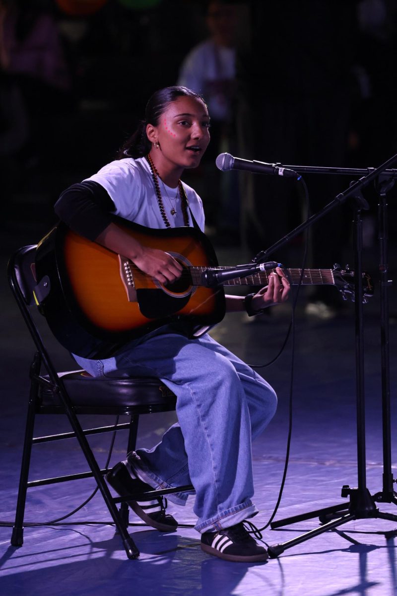 Adela Randolph (12) performs on stage at the Hoco Rally on Oct. 24.